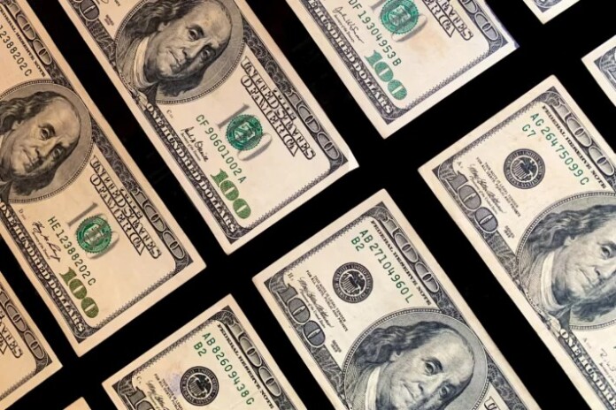 hundred-dollar-bills-on-black-background-2024-12-02-18-15-20-utc_031220245355.jpg-710x473