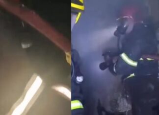 Homem é retirado de casa em chamas por bombeiros durante incêndio no bairro Cachoeirinha
